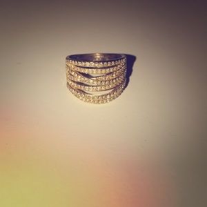 Gold Ring with overlapping jewels